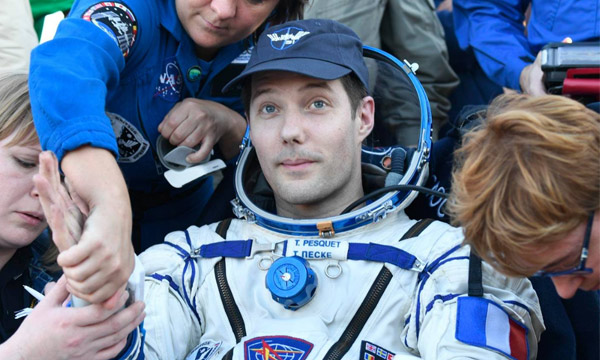 Astronauts return after marathon ISS mission